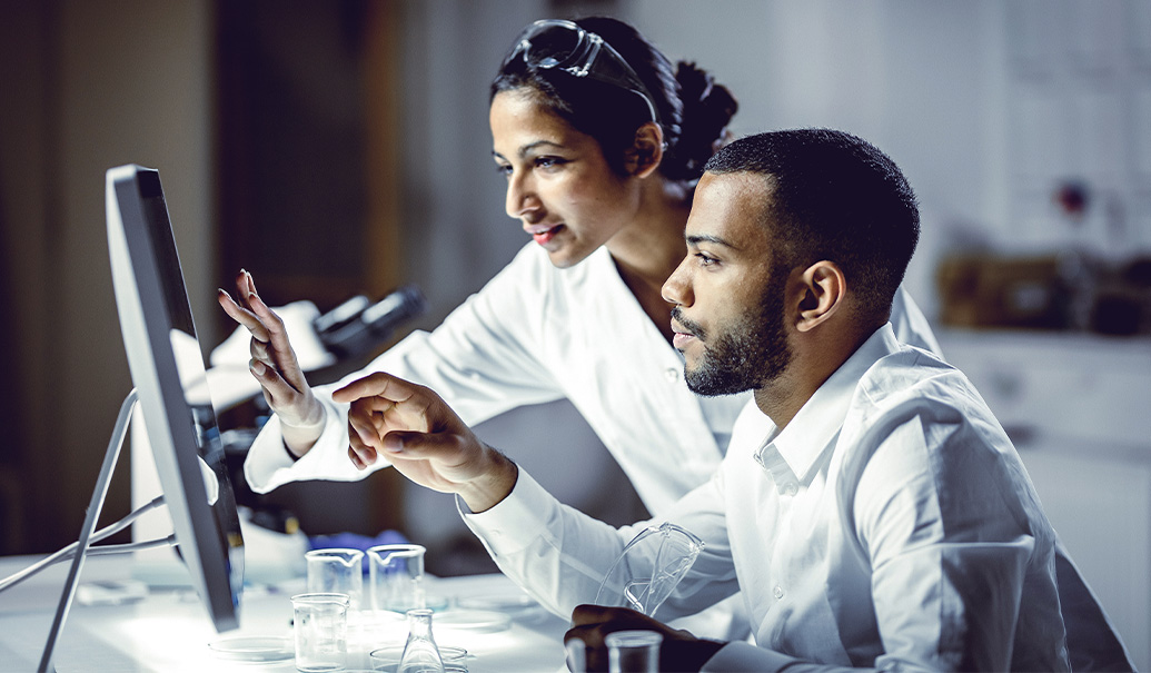 scientists-working-in-laboratory-using-touch-screen-insight